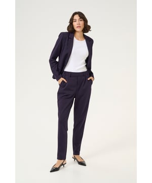 Regular fit,Elastische Taille,Lang,Slim  30° waschbar, Nicht bleichen, Nicht im Trockner trocknen, Tropnass aufhängen im Schatten, Kalt bügeln max. 110° C, Trockenreinigung  76% Polyester (Recycelt),20% Viskose,4% Elasthan
