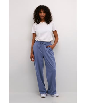 Regular fit,Elastische taille,Lange lengte,Relaxed  Wassen op 30°, niet bleken, niet in de droger drogen, Druipnat ophangen in de schaduw, koud strijken max. 110° C, Droogreiniging  76% Polyester (Gerecycled),20% Viscose,4% Elastaan