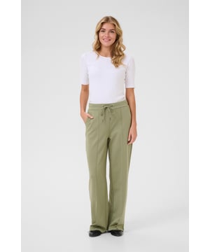 Regular fit,Elastische taille,Lange lengte,Relaxed  Wassen op 30°, niet bleken, niet in de droger drogen, Druipnat ophangen in de schaduw, koud strijken max. 110° C, Droogreiniging  76% Polyester (Gerecycled),20% Viscose,4% Elastaan