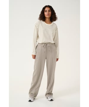 Regular fit,Elastische taille,Lange lengte,Relaxed  Wassen op 30°, niet bleken, niet in de droger drogen, Druipnat ophangen in de schaduw, koud strijken max. 110° C, Droogreiniging  76% Polyester (Gerecycled),20% Viscose,4% Elastaan