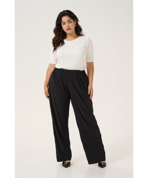 Loose fit,Elastische taille,Lange lengte,Relaxed  Wassen op 30°, niet bleken, niet in de droger drogen, Druipnat ophangen in de schaduw, warm strijken max. 150° C, Droogreiniging  100% Polyester