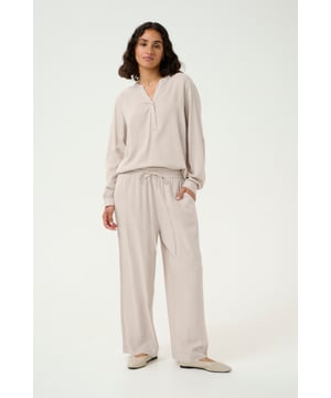 Loose fit,Elastische Taille,Knöchellänge,Weite leg  Schonwäsche 30°, Nicht bleichen, Nicht im Trockner trocknen, Tropnass aufhängen im Schatten, Warm bügeln max. 150° C, Trockenreinigung  70% Viskose (LivaEco™),30% Leinen