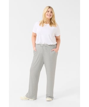 Loose fit,Elastische taille,Lange lengte  Wassen op 30°, niet bleken, niet in de droger drogen, Druipnat ophangen in de schaduw, warm strijken max. 150° C, Droogreiniging  97% Polyester,3% Elastaan
