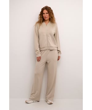 Loose fit,Hoge taille,Lange lengte,Relaxed  Fijne was 30°, niet bleken, niet in de droger drogen, Druipnat ophangen in de schaduw, koud strijken max. 110° C, Droogreiniging  48% Polyester,47% Viscose,5% Elastaan