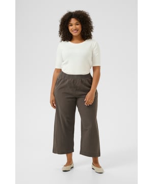 Loose fit,Elastische Taille,Knöchellänge,Weite leg  30° waschbar, Nicht bleichen, Trocknen im Trockner schonend, Tropnass aufhängen im Schatten, Warm bügeln max. 150° C, Trockenreinigung  100% Baumwolle