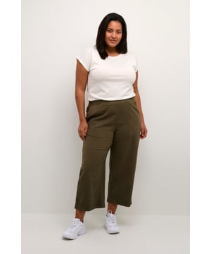 Loose fit,Elastische Taille,Knöchellänge,Weite leg  30° waschbar, Nicht bleichen, Trocknen im Trockner schonend, Tropnass aufhängen im Schatten, Warm bügeln max. 150° C, Trockenreinigung  100% Baumwolle