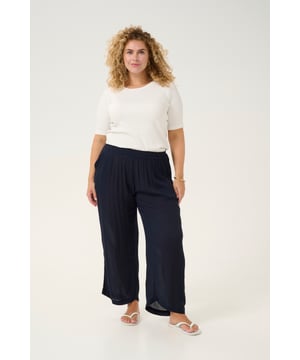 Loose fit,Elastische taille,7/8 lengte,Relaxed  Fijne was 30°, niet bleken, niet in de droger drogen, Liggend laten drogen in de schaduw, koud strijken max. 110° C,.  100% Viscose (LENZING™ ECOVERO™)