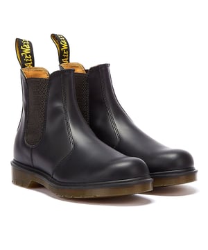 These Dr. Martens Chelsea boots are crafted from a smooth black leather upper and elasticated side panels and branded heel tabs ensure the perfect fit and an easy on/off.