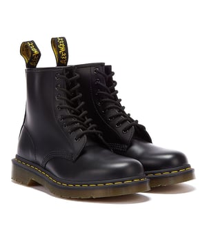 Crafted from a quality black leather upper and finished with a glossy sheen for a smarter look, these are boots that can be easily cleaned and polished. Complete with Dr. Martens signature yellow welt stitching and branding.