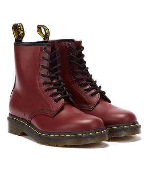 The Cherry Red ankle boot makes a stylish update of the classic 'Air Wair' lace up ankle boot. Constructed from a supple, smooth leather with added gloss, and all the characteristic features associated with Dr. Martens boots.