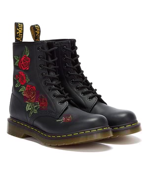 The 1460 Vonda boot makes a stylish update of the classic Dr. Martens 8 eyelets boots borrowing style from the 14-eye 1914 Vonda. Crafted from softy leather upper with embroidered roses cascading down the side of the boot. Complete with all the characteristic features associated with Dr. Martens boots as grooved sides, contrast yellow welt stitching and AirWair™ heel-loop.