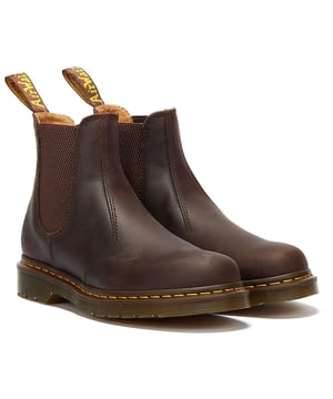 The 2976 is DM's timeless Chelsea boot  first produced in the 70s and revered since for its sure fit; easy on/off; and effortless style. This version boasts iconic yellow stitching on the upper and is crafted from durable Crazy Horse leather  offering a rugged yet slick style.