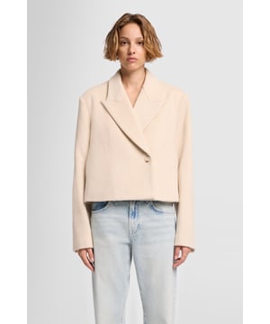 Damen  Wenn es um Investment-Pieces geht, ist unsere Jacke der neuen Saison ein Musterbeispiel. Sie ist luxuriös aus milchfarbener Wolle gefertigt und hat eine kastige, kurze Silhouette mit zweireihiger Vorderseite und verdeckten Verschlüssen. Perfekt als Ergänzung zu Ihrer Lieblingsjeans.