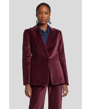 Damen  Unser neuer Blazer aus beerenrotem Baumwollsamt ist eine luxuriöse Ergänzung für Ihre Abendgarderobe. Tragen Sie dieses elegant geschnittene Teil mit der passenden Schlaghose oder zu Jeans mit einer Vintage-Waschung.