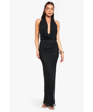 Dramatic waterfall neckline creates a bold, head-turning silhouette
        Figure-hugging mesh fabric contours to your body for a flattering fit
        Halterneck design showcases shoulders and back for an alluring look
        Floor-length maxi cut offers elegant movement as you walk
        Backless design adds a daring element to this sophisticated piece
    
    Command attention in this striking mesh maxi dress from Boohoo, designed to make an unforgettable impression. The showstopping waterfall neckline drapes beautifully across the dcolletage, whilst the halterneck style elegantly frames your shoulders. Style with strappy metallic heels and statement cuffs as seen on our model for a night-out ensemble that demands attention. The form-fitting silhouette hugs your curves in all the right places, whilst the backless design ensures you'll leave a lasting impression when you walk away. Perfect for cocktail parties, club nights or special evening events where you want to stand out from the crowd. This versatile dress transitions effortlessly from summer soires to autumn gatherings with the right accessories.