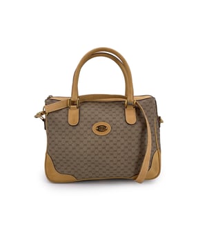 VINTAGE, RRP AS NEW
Step into a world of timeless sophistication with this exquisite vintage Gucci satchel, a true icon of luxury and enduring style. Crafted from Gucci's signature beige monogram canvas and trimmed with rich tan leather, this piece marries elegance with durability in a way only Gucci can.  The standout gold metal GG logo on the front adds a hint of sporty chic to the refined silhouette, making it instantly recognizable. Designed with versatility in mind, the bag features a removable shoulder strap, allowing you to carry it as a chic handheld or wear it comfortably crossbody or over the shoulder.  The upper zipper closure secures your essentials, while the interior-lined in smooth beige leather-reflects the brand's unwavering commitment to quality and detail. Inside, a convenient side zip pocket offers easy organization for your smaller valuables. The "Gucci - Made in Italy" tag is a hallmark of ity, underscoring the heritage and craftsmanship behind every stitch.  Whether you're expanding a vintage collection or seeking a timeless everyday bag, this vintage Gucci satchel promises to elevate any ensemble with effortless grace, style, and function. Condition Rating: B - VERY GOOD CONDITIONCondition Details: Gently used. Some darkness and scartches on leather trimdue to normal use. Some wear of use on bottom corners. Some scratches on the internal lining. Please check the photos carefully and ask if you need to know more details or if you have any doubts.Measurements (cm):Depth: 15.2Height: 22.9Length: 30.5Other Details: Dustbag? NoKeys? NoBox? No Measurments:  width: 152 mm length: 305 mm height: 229 mm