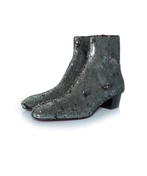 Christian Louboutin Huston Glitzerstiefel in Silber. Der Artikel ist neu und ungetragen.