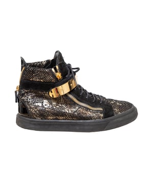 VINTAGE, RRP AS NEW
Elevate your sneaker game with Giuseppe Zanotti's Printed Snakeskin Sneakers. The high-top design features a unique snakeskin print on the signature Coby model, with a velvet and leather construction. Complete with a double gold metal strap and 'Signature' detail for added style. 
Remarks: there are some signs of wear. Measurments:  length: 746 mm