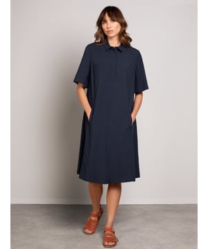 With a collared neckline and flattering swing shape, this dress is designed for effortless style. The half-length sleeves provide added comfort, while the blend of viscose and linen ensures a soft feel, perfect for both casual wear or occasions.