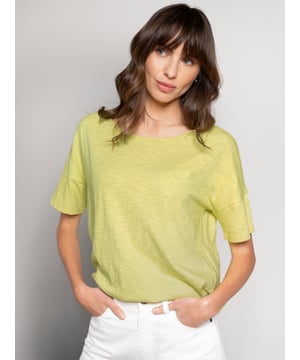 Designed with a round neckline and relaxed drop shoulders, this boxy-fit tee offers effortless drape and movement. The slub jersey fabric provides a soft texture, perfect for an easy, versatile style.