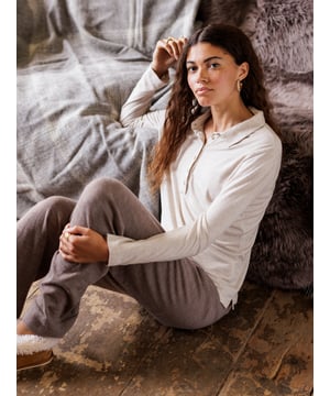With a classic polo neckline, neat collar and long sleeves, this clean jersey top looks smart whilst keeping you super cosy. Details include a button through front placket featuring natural Corozo buttons. The style is easy-to-wear and is great for layering with other items or wearing alone. The wool content blended with viscose gives it longevity of wear throughout the seasons. It has been finished with a garment wash to give it a soft, tumbled look and feel.