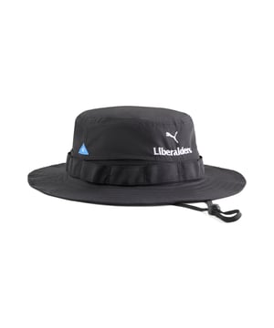 PRODUCT STORY: Step into the new era with the PUMA x LIBERAIDERS collab.&nbsp;This collaboration embraces urban wanderlust by mixing outdoor-inspired elements with the wild energy of a daily city life.&nbsp;This unstructured bucket hat blends outdoor vibes with city energy, featuring embroidered logos on the front. Perfect for those who embrace adventure and style in their daily life. FEATURES & BENEFITS: Made with at least 90% recycled materials. DETAILS: Unstructured crown and hat structure; Regular visor and brim; Daisy chain webbing; Chin strap with cord stopper; Features PUMA x LIBERAIDERS co-branding details.