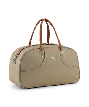 PRODUCT STORY: Step up your game with this PUMA masterpiece. Featuring roped carry handles, metal zip pullers, and an embroidered PUMA Cat logo, this bag combines minimalistic aesthetics with sophisticated details. Perfect for those who appreciate quality and contemporary design. FEATURES & BENEFITS: Made with at least 50% recycled materials. DETAILS: Two-way metal zip opening with twin stitch detail; Roped carry handles with braiding detail; Authentic piped construction; Sophisticated details; Dimensions: W50cm / D22cm / H29cm; Volume: 30L; PUMA branding details.