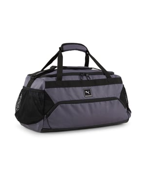 PRODUCT STORY: Gear up for your ultimate workout with this training must-have. An adjustable, padded strap and sturdy handles let you haul heavy gear while multiple pockets keep essentials close. Front and side mesh pockets plus an internal shoe compartment give everything its place so you can focus on smashing personal bests. Pack it all in and get training. FEATURES & BENEFITS: Made with at least 50% recycled materials. DETAILS: Two-way U-shape zip opening into main compartment; Zip opening into front and back pocket; Adjustable webbing shoulder strap with shoulder pad, two webbing carry handles with padded connector; Side mesh pockets; Dimensions: W56cm / D27cm / H25cm; Volume: 24L; PUMA branding details.