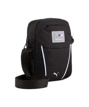 PRODUCT STORY: Step up your game with PUMA's latest must-have. Featuring a sleek design with a contrast colour line, premium BMW M Motorsport branding, and a spacious main compartment. Perfect for keeping your essentials organised and looking sharp on the go. FEATURES & BENEFITS: Made with at least 50% recycled materials. DETAILS: Internal zip pocket; Adjustable strap; Premium silicone BMW M Motorsport logo badge; Embroidered Puma cat logo on the front; Contrast BMW M color woven label on the front; PUMA branding details.