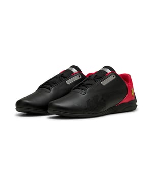 PRODUCT STORY: Inspired by Scuderia Ferrari's iconic design, the Drift Cat Decima 2.0 sneakers accelerate your casual looks. Perforated details and Ferrari's signature colours inject maximum style into every step. FEATURES & BENEFITS: The upper of the shoes is made with at least 20% recycled materials. DETAILS: Regular fit; Synthetic upper; Lace closure; Rubber outsole; Perforation details; PUMA and Scuderia Ferrari branding details.