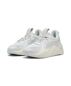 PRODUCT STORY: The RS-X returns for a new generation of consumers who live to express their individuality. The RS-X Soft features a textile base with leather and suede overlays along with a cool 3D-printed Formstrip. FEATURES & BENEFITS: The upper of this shoe is made with at least 20% recycled materials as a step toward a better future.; Running System: PUMA's comfortable cushioning technology celebrates the reinvention of a unique moment and movement in culture. DETAILS: Textile base; 3D printed Formstrip; Leather toe and heel overlay; Synthetic quarter panel and eyestay; Suede vamp and eyestay underlays; RS midsole; Rubber outsole.