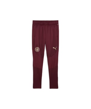 PRODUCT STORY: Cityzens, show your pride with these PUMA training pants. Featuring an elasticated waistband, flat drawcords, zip leg openings, and zip pockets, they're perfect for any Manchester fan. The iconic badge and Cat Logo on the legs, along with jacquard fabric graphics, bring the spirit of Etihad Stadium to life. FEATURES & BENEFITS: dryCELL: Performance technology designed to wick moisture from the body and keep you free of sweat during exercise; Made with 100% recycled material excluding trims & decorations. DETAILS: Slim fit; Main material: Pique; Below knee length; Medium rise; Elasticated waistband with flat drawcords; Zip leg opening; Zip pockets; PUMA Cat logo placed on the left leg; Manchester City crest placed on the right leg.