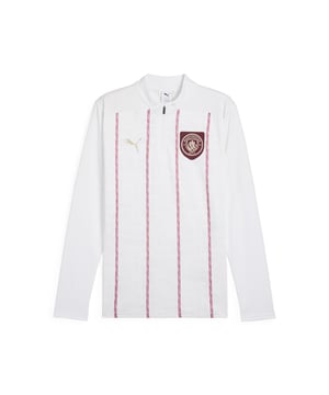 PRODUCT STORY: Show your love for the Cityzens with this PUMA quarter-zip top. Featuring the Man City badge, a printed graphic, and the iconic PUMA Cat logo, it's perfect for cheering at the Etihad Stadium or repping your team wherever you go. Ready for match day? FEATURES & BENEFITS: dryCELL: Performance technology designed to wick moisture from the body and keep you free of sweat during exercise; Made with 100% recycled material excluding trims & decorations. DETAILS: Slim fit; Pique material; Regular length; Collar; Quarter zip; Long sleeves; Printed graphic; Manchester City badge on the left chest; PUMA Cat logo on the right chest.