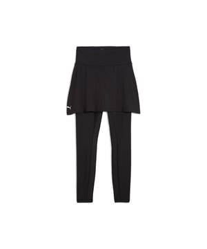 PRODUCT STORY: Embrace every run with high-rise running tights, which include a skirt for maximum coverage. Stay dry with dryCELL technology, and keep your valuables secure in the hidden waistband pocket. Perfect for those who value style and functionality in their fitness gear. FEATURES & BENEFITS: Made with at least 50% recycled materials; dryCELL: Performance technology designed to wick moisture from the body and keep you free of sweat during exercise. DETAILS: Tight fit; Interlock fabric; Regular length; High rise; PUMA branding details.