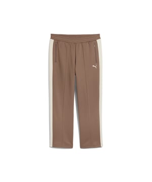 PRODUCT STORY: Step up your game with PUMA's relaxed track pants. Featuring iconic T7 stripes, zip pockets, and pintuck stitching, these pants offer a sleek, straight fit. The elasticated waistband with drawcord ensures a perfect fit for every adventure. FEATURES & BENEFITS: Made with at least 50% recycled materials. DETAILS: Relaxed fit; Spacer fabric; Regular length; Medium rise; Side Pocket; PUMA branding details.