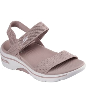 Enjoy supportive casual comfort on warm sunny days with the Skechers GO WALK Arch Fit 2.0 sandal. This knit quarter strap sandal features a textile upper with lightweight ULTRA GO cushioning and an Arch Fit footbed