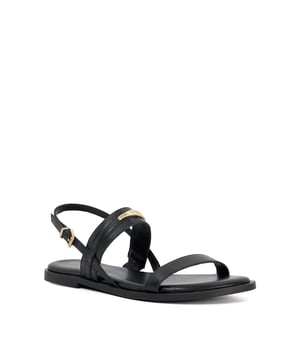 A contemporary flat branded sandal crafted with leather straps and an adjustable ankle strap, the bounce back foam in sole and lightweight rubber sole adds all-day-comfort.