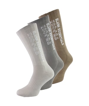 BLANK ESSENTIALS 3 Pack Cotton Socks: Step into a world of unmatched comfort and subtle style with the BLANK ESSENTIALS 3 Pack Cotton Socks. Specially designed to fit a range of shoe sizes, these crew socks effortlessly complement both your casual and official outfits, becoming an essential component of your wardrobe. Revel in the luxurious comfort these socks bring, an indispensable item for every discerning gentleman. BLANK ESSENTIALS socks are meticulously crafted to inject a wave of comfort into your daily grind. Featuring a harmonious blend of softness, breathability, and gentle support, these socks are poised to accompany you through all seasons. Made from a premium mix of 78% cotton, 11% polyamide, 9% polyester, and 2% elastane, they fit snugly into sizes 7-11 UK. The BLANK ESSENTIALS 3 Pack Cotton Socks boast several features. Their cushioned foot and smooth toe seams are signs of thoughtful design aimed at maximizing your comfort. Moreover, the easy stretch, non-binding rib ensures a perfect fit without restricting circulation. Whether you choose the classic white, sleek black, or the assorted colours pack, these socks are bound to elevate your daily comfort to new heights. Extra Product Information: - Supremely soft and comfortable - Made with high-quality materials - Easy stretch for a perfect fit - Non-binding for all-day comfort - Available in versatile colour options - Suitable for sizes 7-11 UK - Ideal for both casual and formal occasions - A must-have staple for the modern man