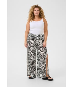 Loose fit,Elastische taille,Lange lengte,Relaxed  Fijne was 30°, niet bleken, niet in de droger drogen, Liggend laten drogen in de schaduw, koud strijken max. 110° C,.  100% Viscose (LENZING™ ECOVERO™)