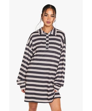 Striking striped pattern for a bold, eye-catching look
        Oversized fit with long, voluminous sleeves for ultimate comfort
        Collared neckline with button placket adds a sporty touch
        Versatile T-shirt dress silhouette for effortless styling
        Soft jersey fabric ensures all-day wearability
    
    Make a statement in this chic striped T-shirt dress from Boohoo. Perfect for the fashion-forward woman who values both style and comfort, this dress combines casual ease with trendy flair. The oversized fit and long, billowing sleeves create a relaxed silhouette that's ideal for various casual occasions. Style it with trainers and a crossbody bag for a laid-back daytime look, or dress it up with ankle boots and statement earrings for an evening out with friends. The collared neckline and button placket add a sporty element, making it a versatile piece for family gatherings or weekend brunches. Layer it with a denim jacket on cooler days or wear it on its own when the temperature rises. This T-shirt dress is a must-have addition to your wardrobe, offering endless styling possibilities for the modern, fashion-conscious woman.