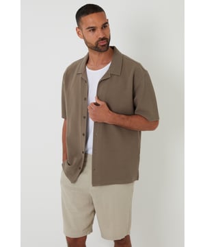 Exude laid back charm with this textured revere collar shirt from Threadbare. Crafted from soft knit textured fabric, this shirt has short sleeves, button up fastening and an on-trend revere collar. Complete the look with the matching textured shorts for an effortless holiday co-ord.