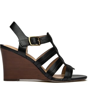 Sandalias negras estilo pescador Josie de Cole Haan para mujer, fabricadas en piel y suela de goma y cuerda. Presentan: tacón de 9 cm, cierre de hebilla, plantilla acolchada y suela con borde de chapa de madera.