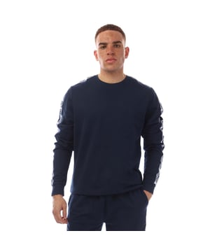Mens DKNY Sea Dogs Long Sleeve Top in navy.- Crewneck.- Ribbed cuffs and hem.- DKNY branded ribbon down the arms.- Regular fit.- 100% Cotton.- Ref: N56806DKYNV