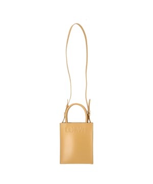 VINTAGE, RRP AS NEW
A compact icon of craftsmanship, the Loewe Logo Small A5 Tote is expertly crafted from vibrant yellow calfskin leather in the brand’s signature envelope construction. Featuring an embossed Loewe logo across the front, this structured mini tote is as functional as it is striking. With a Herrington cotton canvas lining, interior slip pocket, and detachable, adjustable strap, it offers versatile styling—wear it by hand, on the shoulder, or crossbody.


Loewe Logo Small A5 Tote in Yellow Calfskin Leather
Condition: Excellent
Signs of wear: No retail tag, Never been used., Out of store condition, No sign of being worn.
Packaging: Dust bag
Color: Yellow 
Material: Leather | leather
Size: One Size | One Size
Measurements: Width: 60; Height: 210; Length: 170; Handle drop: 260; Strap length: 1300
SKU: TONPUDEBA501134W