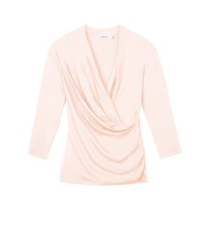 A timeless addition to every wardrobe, crafted from a luxurious fabric blend. This fitted top offers the same flattering silhouette as our popular Camille Crossover, shifted from print into versatile block colours.