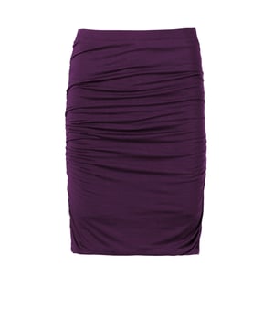 The clever double layer construction of this fitted skirt creates a smooth, figure-enhancing look.