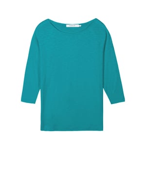 Indulge in effortless elegance with this versatile top crafted from soft viscose slub jersey. The relaxed fit drapes beautifully, creating a flattering silhouette for all body types. Its subtle sheen adds a touch of sophistication, making it perfect for both casual outings and dressier occasions.