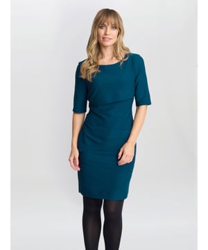 This corded effect fabric is crafted into modern take on the layer dress.  With laser-cut asymmetrical panels to create dimensions that elongate the body, while the form-fitting silhouette compliments your shape. Designed with elbow length sleeves the additional coverage makes it suitable for various occasions! This dress is lined at the front and measures 96cm