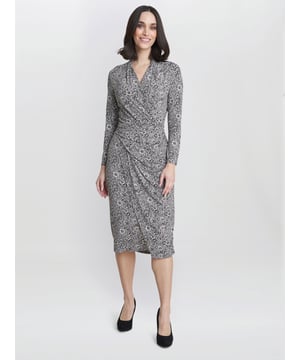 Our new modern jersey  dress features a ruched waist and wrap effect. Perfect for a day-to-evening look.