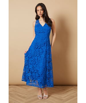 Intricate floral lace overlay creates a romantic, feminine aesthetic
        Flattering V-neckline at front and back for an elegant silhouette
        Sleeveless design perfect for warm-weather occasions
        Midi length falls gracefully below the knee for sophisticated coverage
        Semi-sheer lace detailing adds textural interest and dimension
    
    This enchanting Oasis midi dress showcases delicate floral lace throughout, making it a standout choice for special occasions. The feminine V-neckline frames the dcolletage beautifully, while the matching V-back adds an unexpected touch of allure. Style with metallic strappy heels as shown for formal events such as weddings or race day celebrations. For evening soires, pair with a sleek clutch and statement earrings to complement the dress's intricate texture. The versatile midi length works wonderfully for garden parties when styled with elegant sandals, or dress it up with a tailored blazer for sophisticated evening affairs. This timeless piece transitions effortlessly from daytime celebrations to evening gatherings with just a change of accessories, making it a valuable addition to your occasion wardrobe.